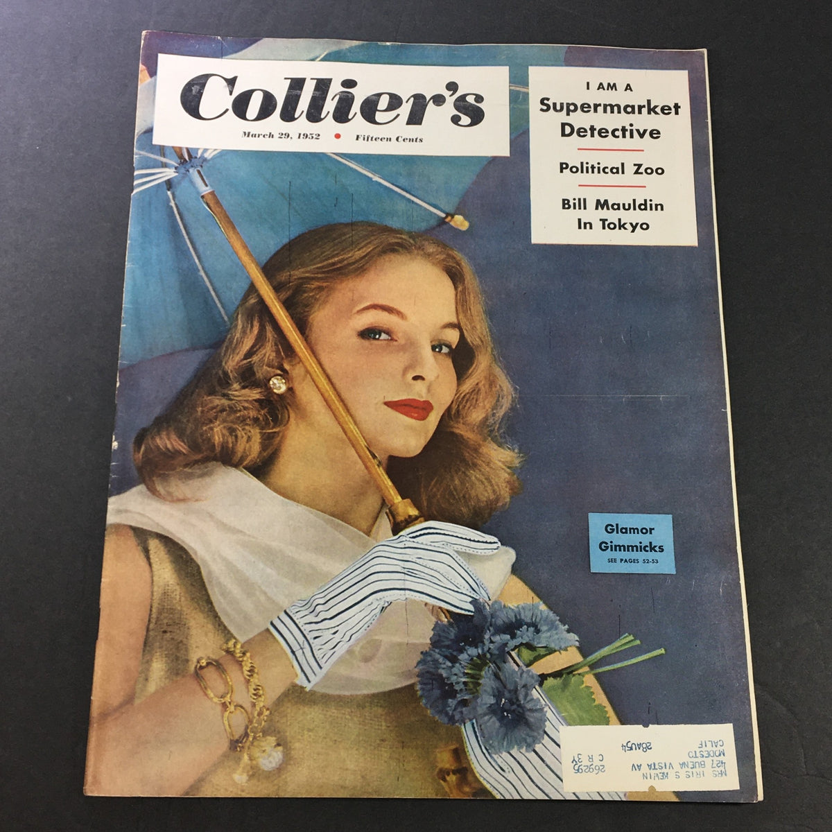 VTG Collier's Magazine March 29 1952 cover featuring a glamorous woman with an umbrella, showcasing the Political Zoo article and Bill Mauldin in Tokyo.