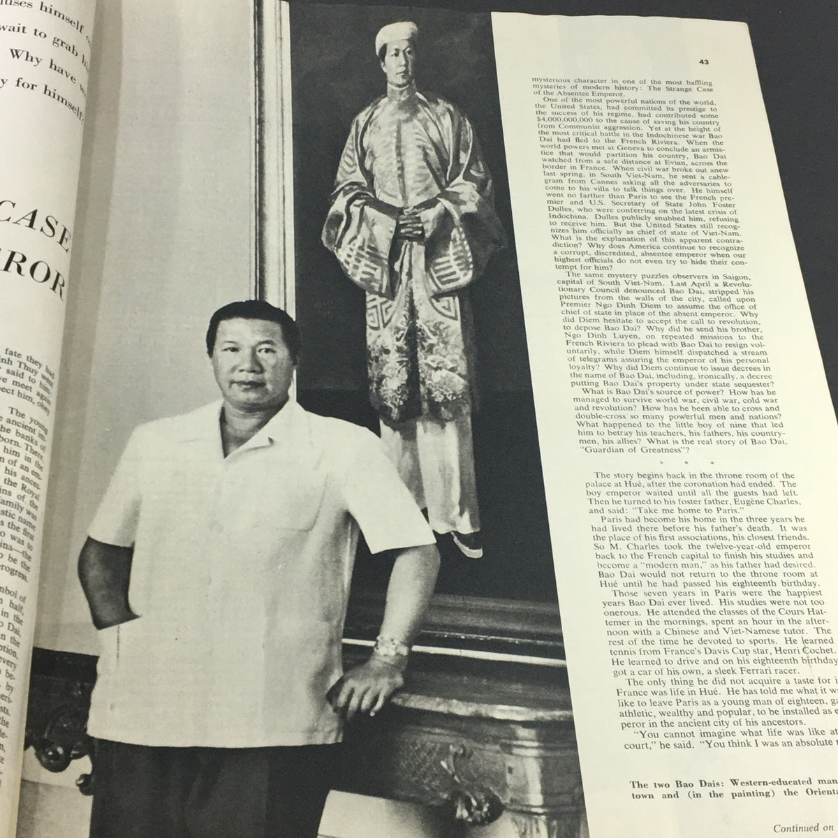 Bao Dai, the former Emperor of Vietnam, standing next to a painting, as featured in Collier's Magazine September 30 1955.