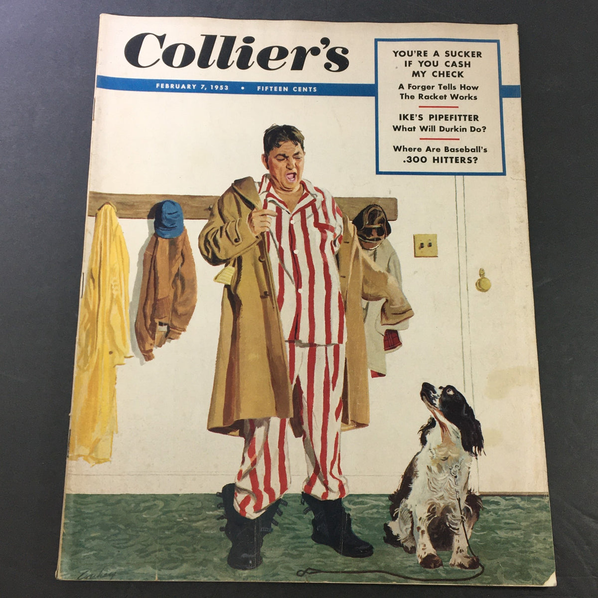Cover of VTG Collier's Magazine February 7, 1953 featuring a man in striped pajamas and a long coat, standing next to a dog. This historic edition showcases Dwight David 'Ike' Eisenhower.