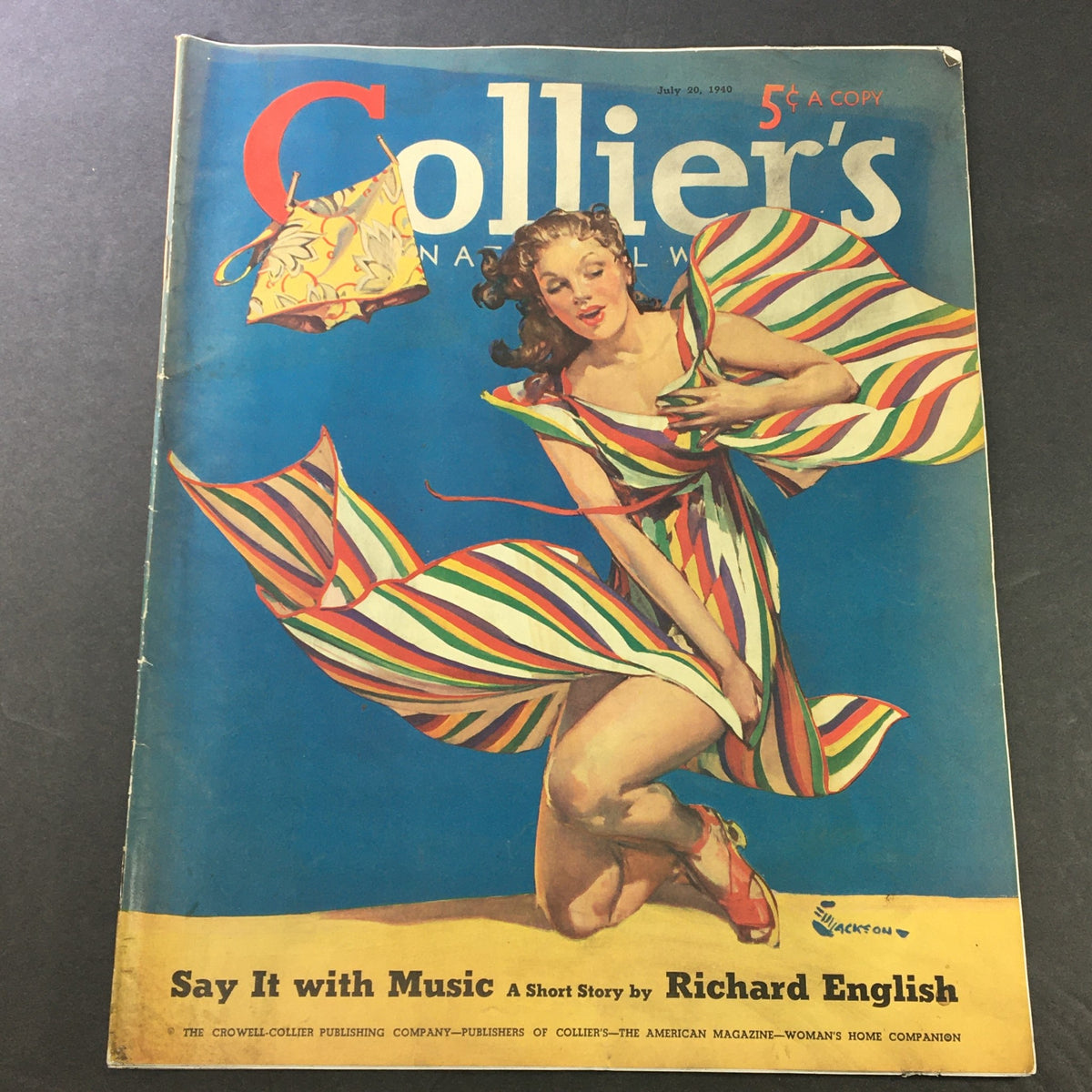 Cover of VTG Collier's Magazine from July 20, 1940, featuring vibrant artwork of a woman in a colorful striped dress, advertising the article 'Say it with Music' by Richard English, showcasing the cultural significance of music in the 1940s.
