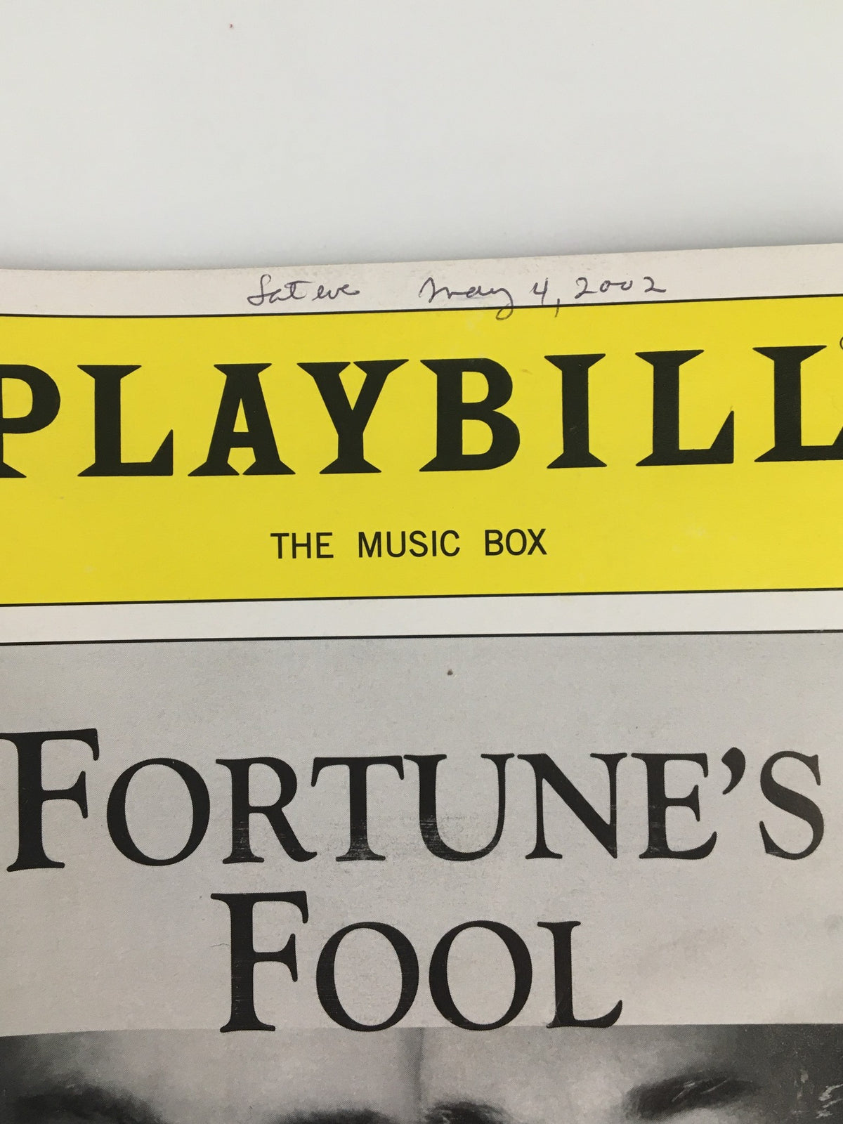 Close-up of the top of the 2002 Playbill for Fortune's Fool showing the date May 4, 2002.