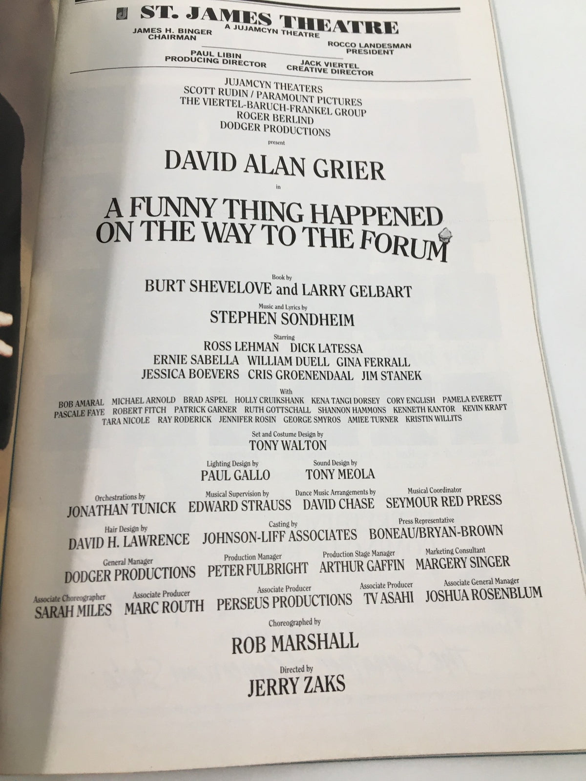 A page from the July 1997 Playbill for A Funny Thing Happened On The Way To Forum, highlighting cast and crew credits at the St. James Theatre.