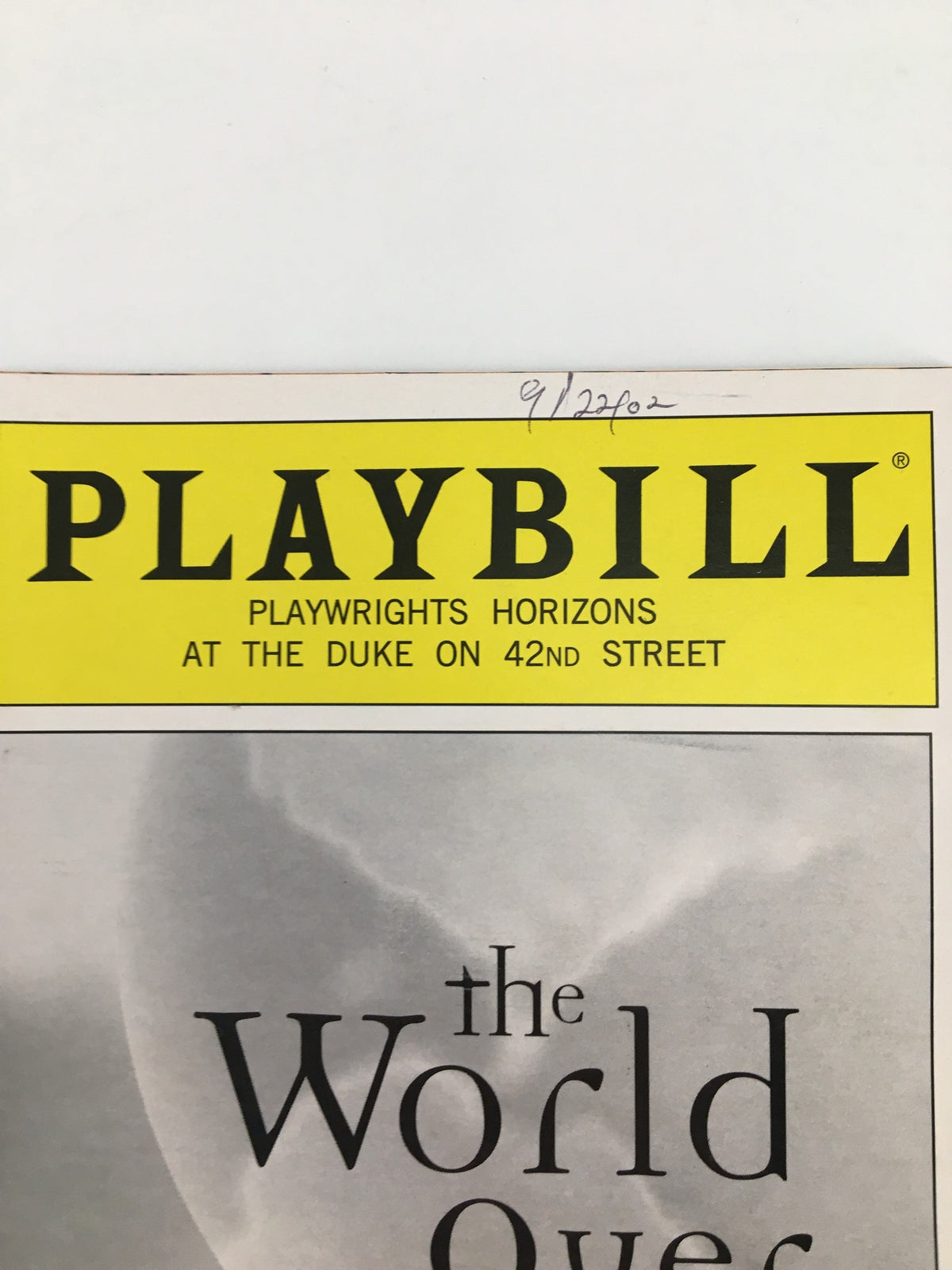 Close-up of the Playwrights Horizons logo on the 2002 Playbill for The World Over by Keith Bunin, highlighting the theatrical branding.