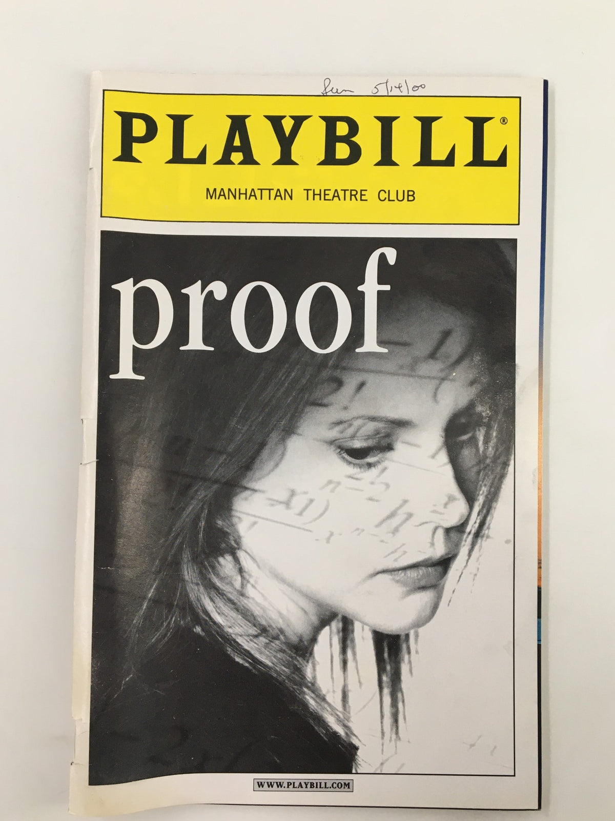 2000 Playbill Manhattan Theatre Club showcasing the cover of 'Proof' featuring a dramatic close-up of a woman's profile against a backdrop of mathematical equations.