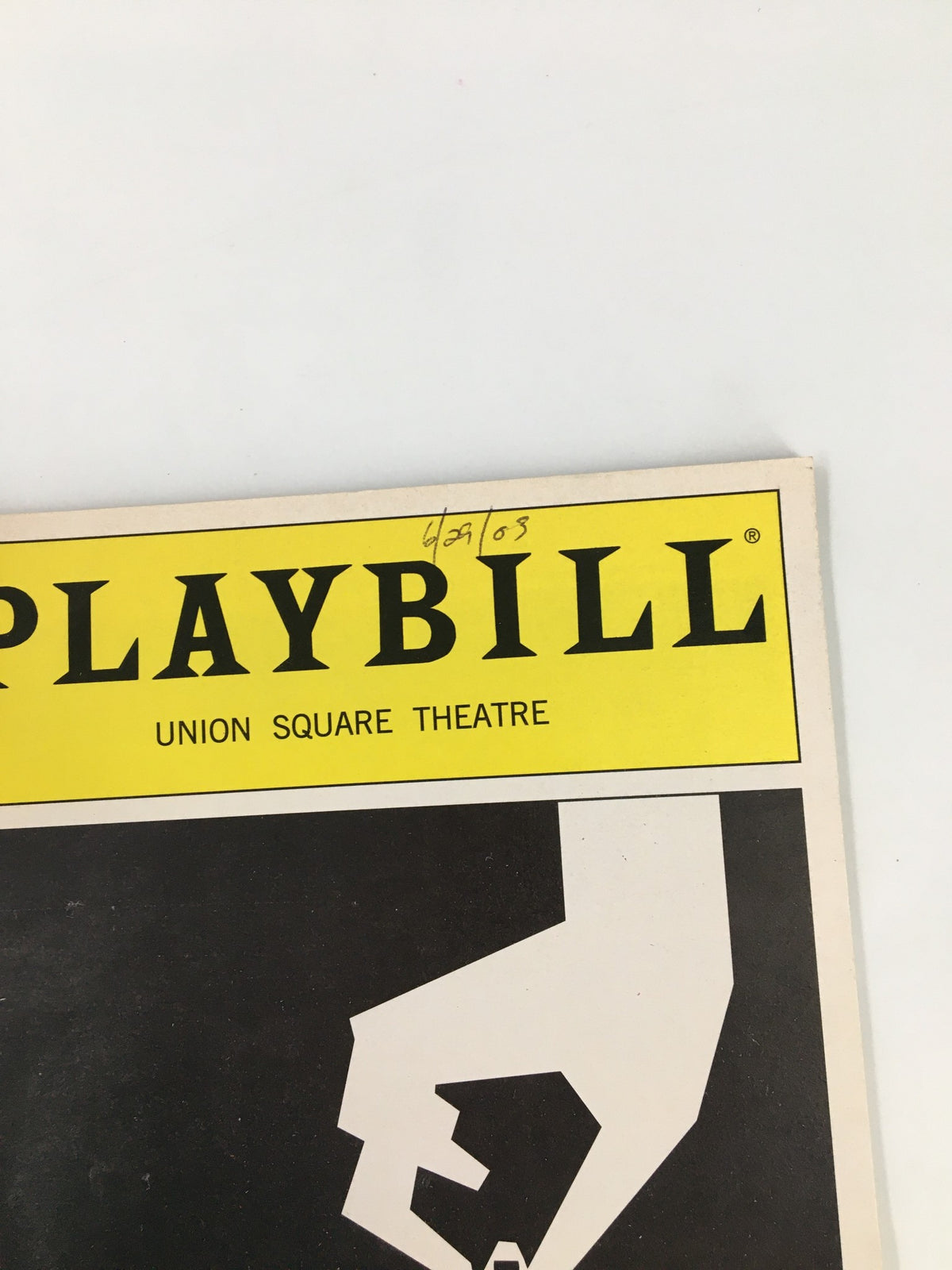 Close-up of the 2003 Playbill from Union Square Theatre featuring a signature and the title Playbill in bold yellow letters. This collectible Playbill highlights Elizabeth Canavan in 'Our Lady of 121st Street'.