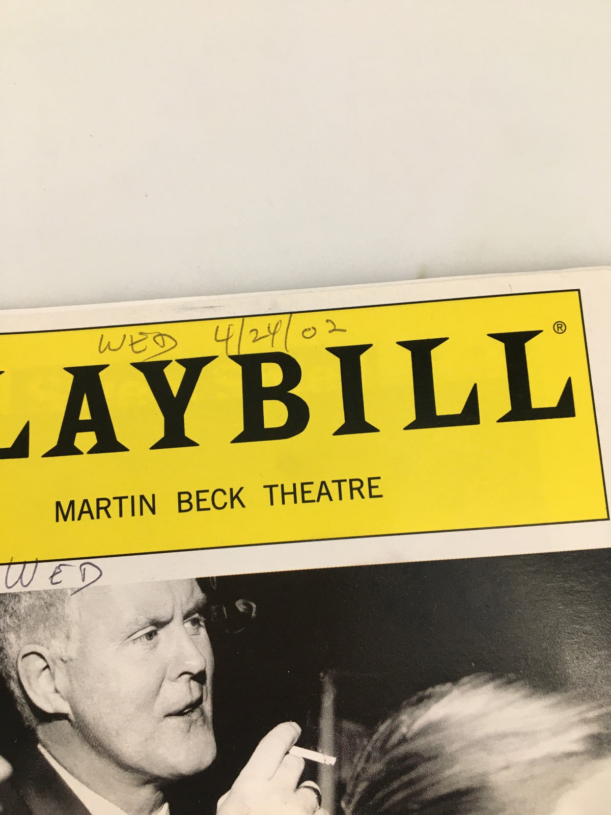 Close-up of the 2002 Playbill from the Martin Beck Theatre with handwritten date 'WED 4/29/02', representing the performance of Sweet Smell of Success.