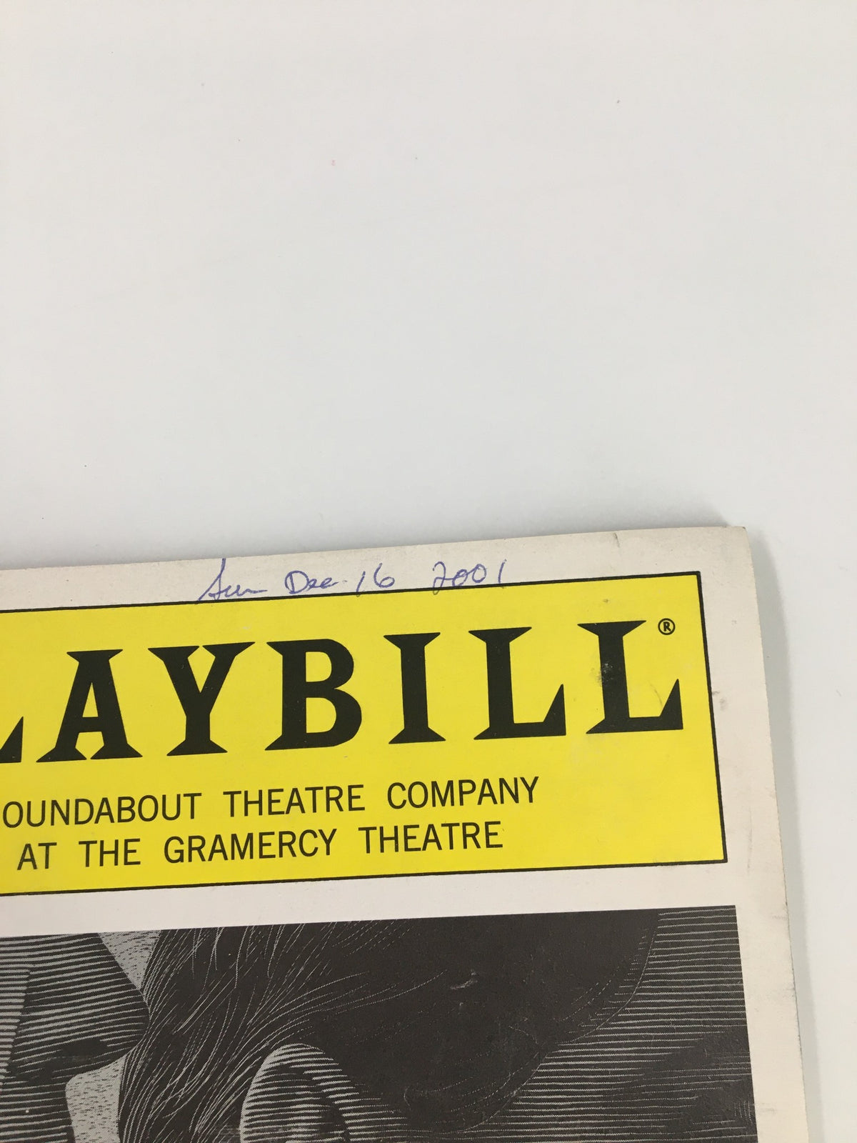 Close-up view of the 2001 Playbill from Gramercy Theatre titled 'Speaking in Tongues,' highlighting the date handwritten as December 16, 2001.