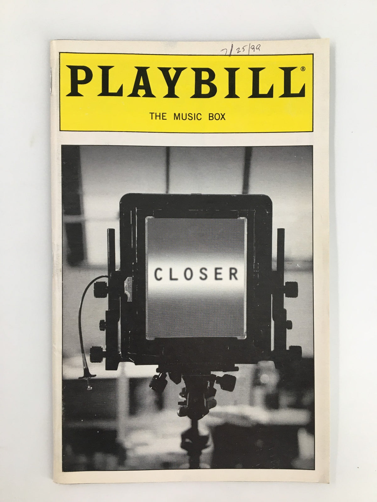 1999 Playbill The Music Box featuring the play 'Closer' by Patrick Marber, showcasing a black and white image of a spotlight with the title 'CLOSER'.