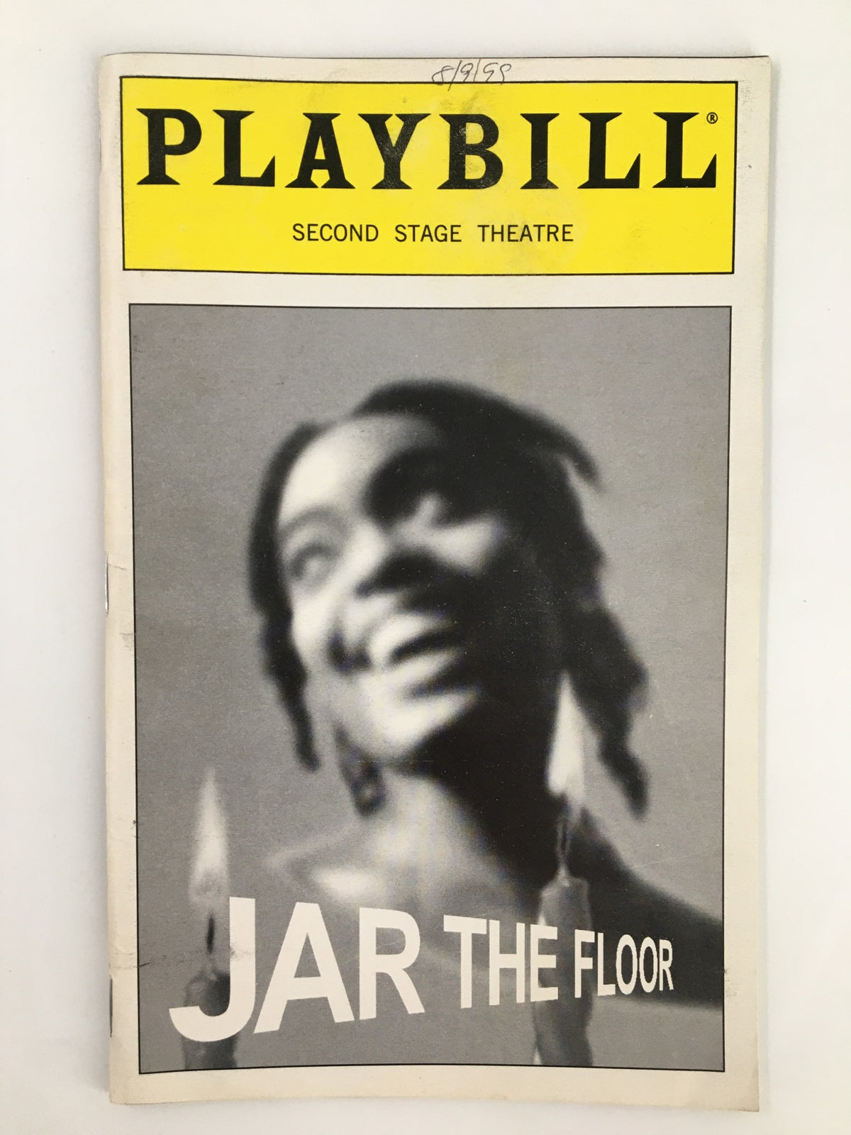 1999 Playbill for Jar the Floor featuring a blurred image of an actress smiling, representing the Second Stage Theatre production starring Irma Hall and Linda Powell.
