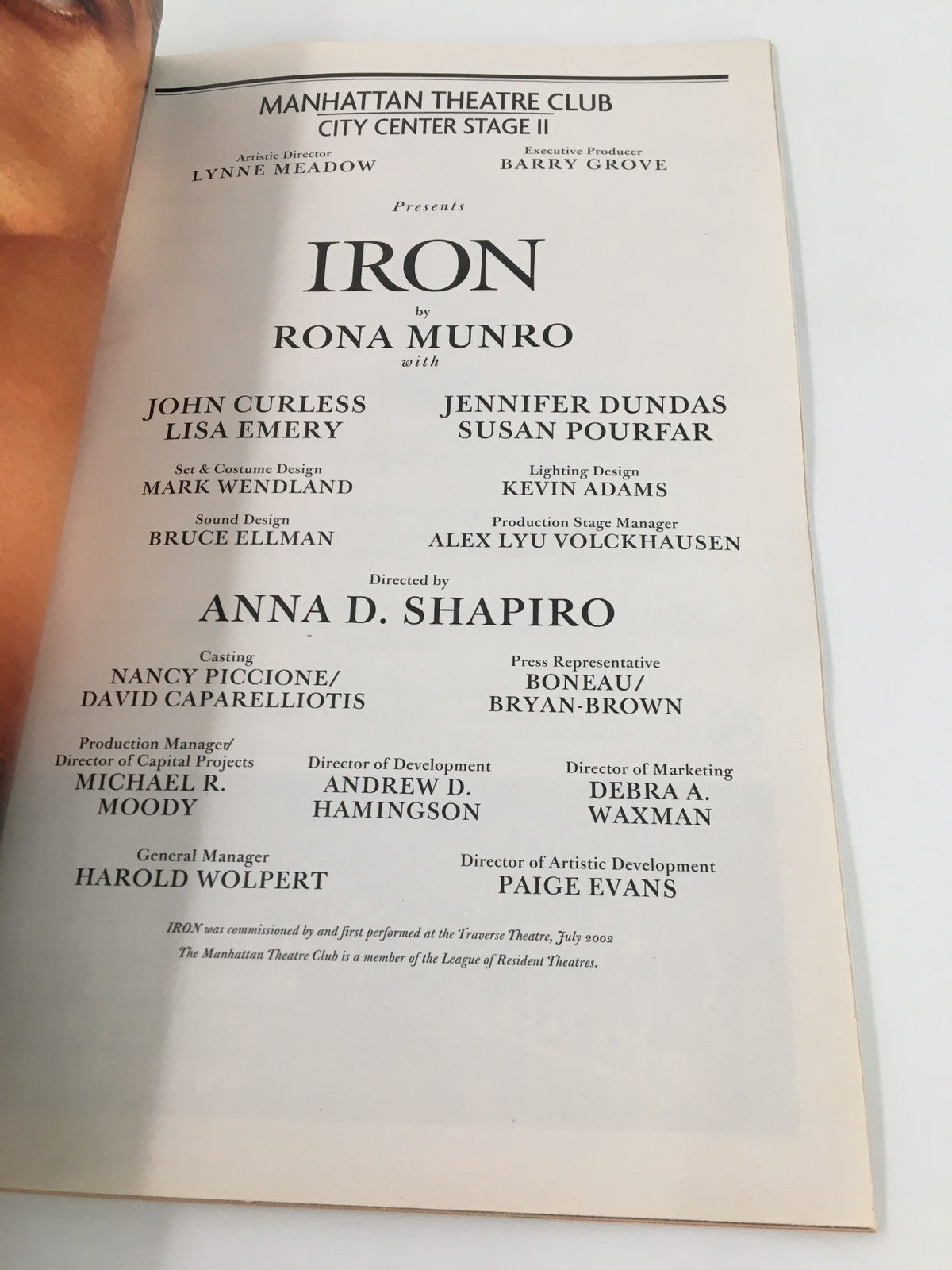 Cast and crew listing page from the 2003 Manhattan Theatre Club Playbill for 'Iron', featuring John Curless and Lisa Emery.