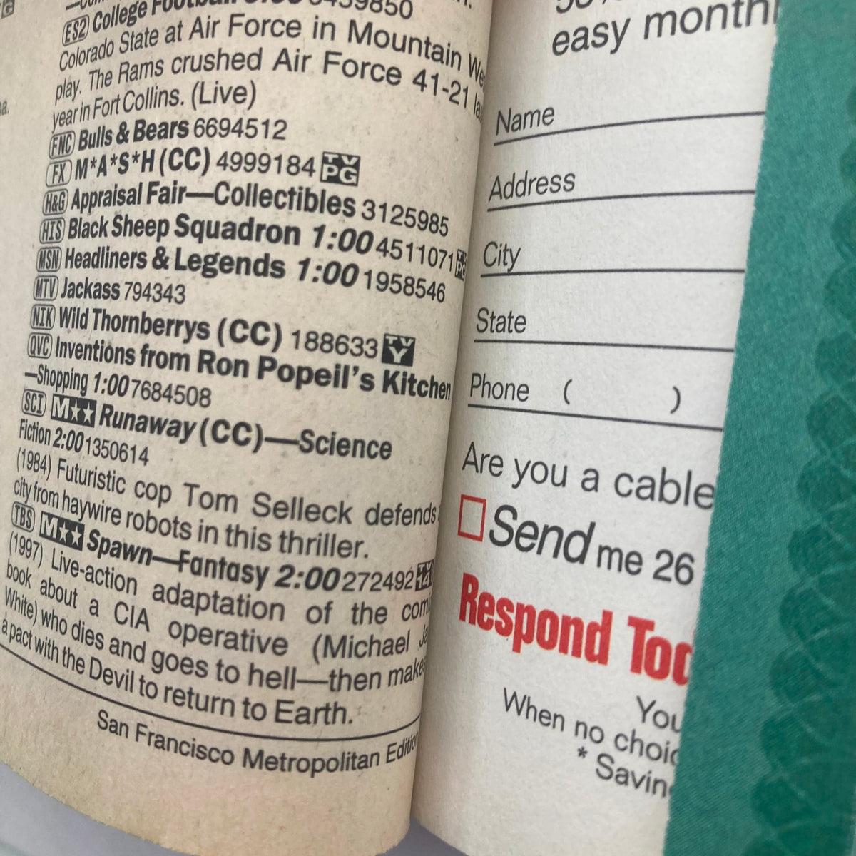 Interior page of TV Guide Magazine November 11 2000 displaying TV listings and advertisements for shows like Jackass and Fantasy.