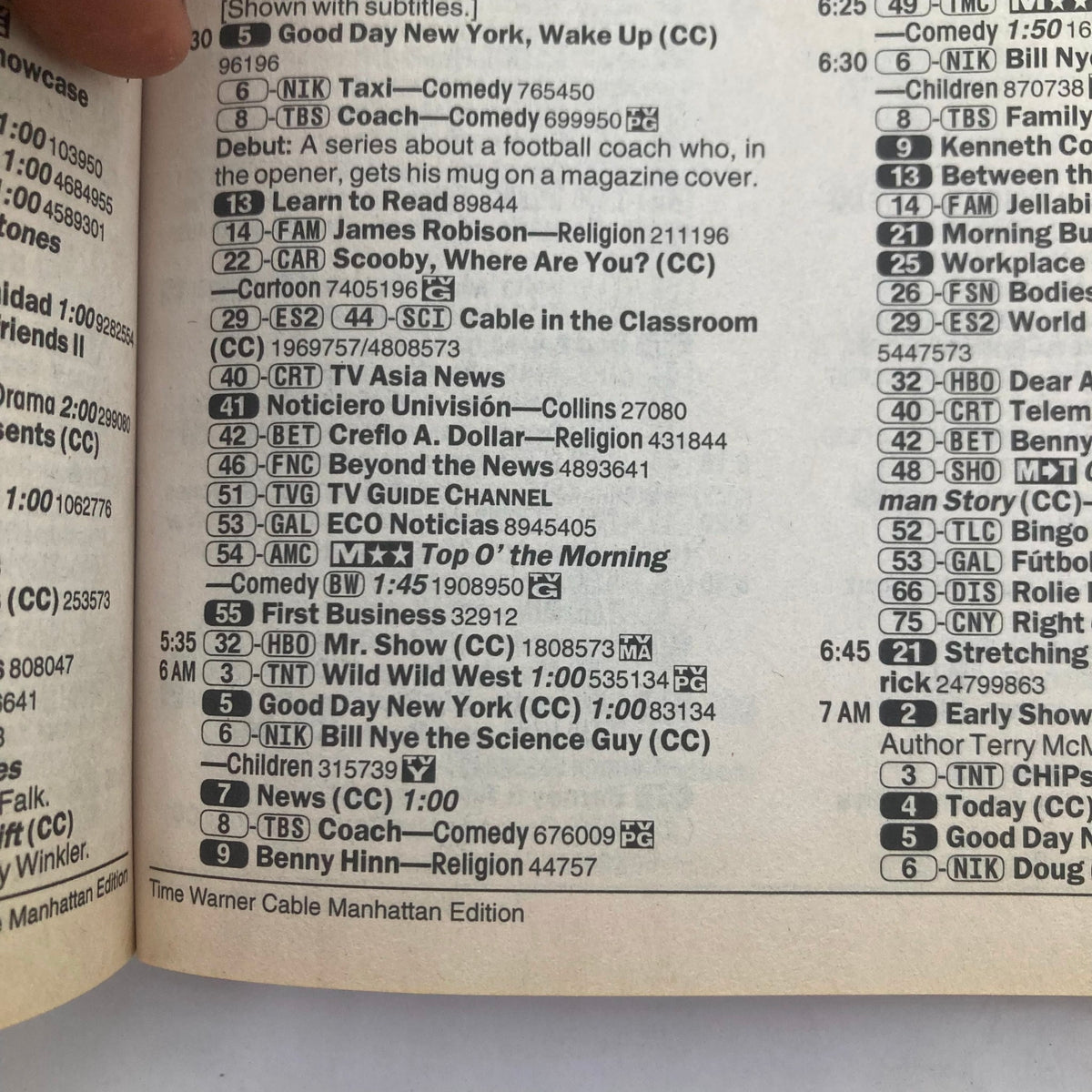 Interior page of TV Guide Magazine January 13 2001, Time Warner Cable Manhattan edition, displaying television listings and programming details.