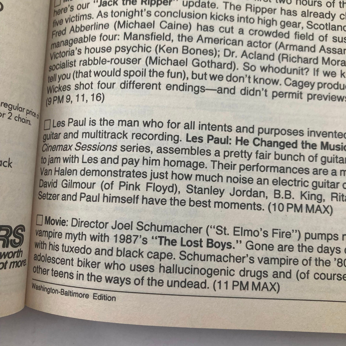 Page from TV Guide Magazine October 22, 1988 featuring articles on Les Paul and the movie 'The Lost Boys'. This issue discusses musical influences and the impact of vampire mythology in cinema during that era.