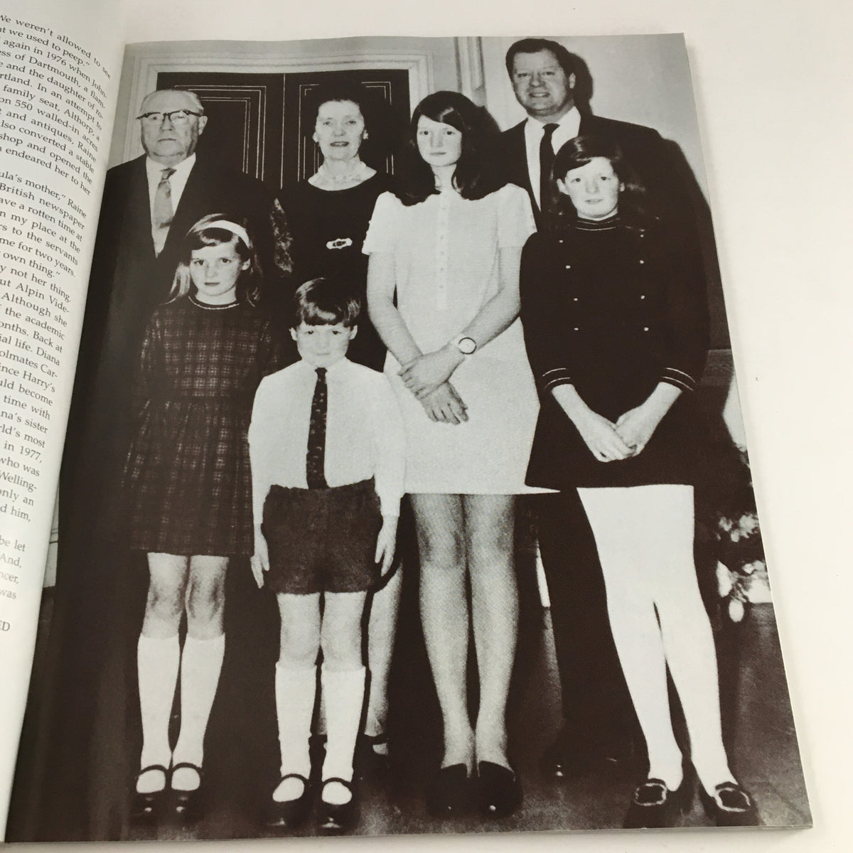 Black and white family photograph featured in People Weekly Magazine Fall 1997, depicting Princess Diana as a child with her family members, offering insights into her early life.