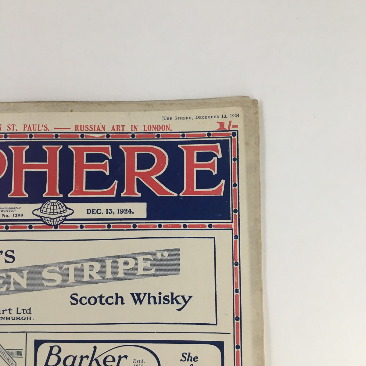 Close-up of The Sphere Newspaper December 13 1924 showing the title and date along with the advertisement for Stewart's Green Stripe Scotch Whisky.