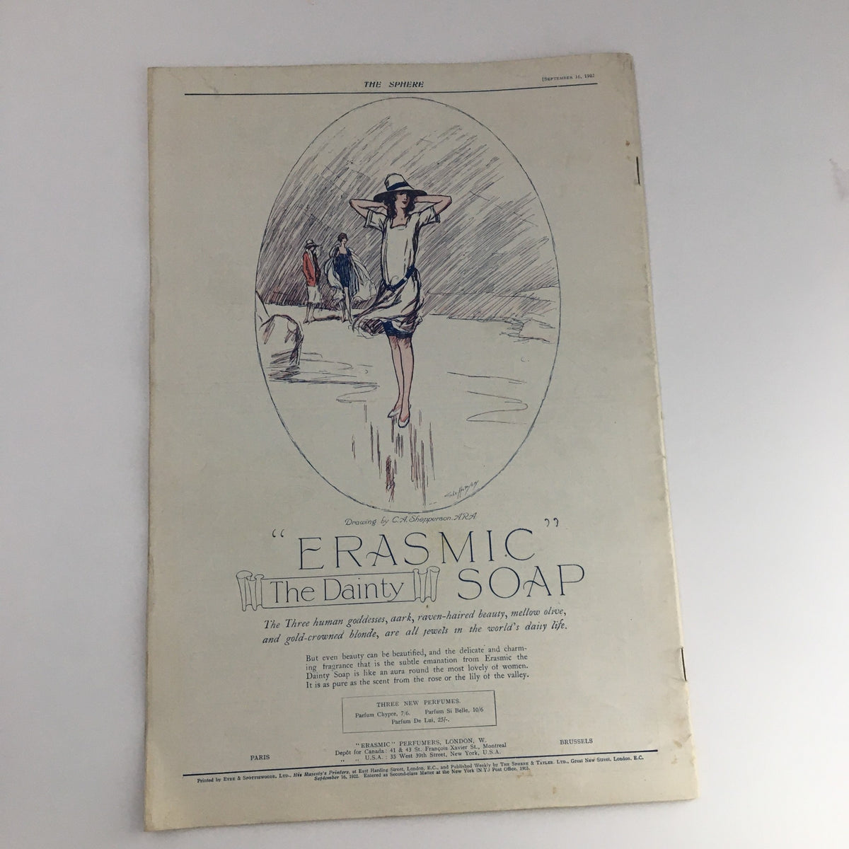 The Sphere Newspaper September 16 1922, featuring an advertisement for Erasmic Soap, illustrating a woman walking on a beach in a stylish outfit.