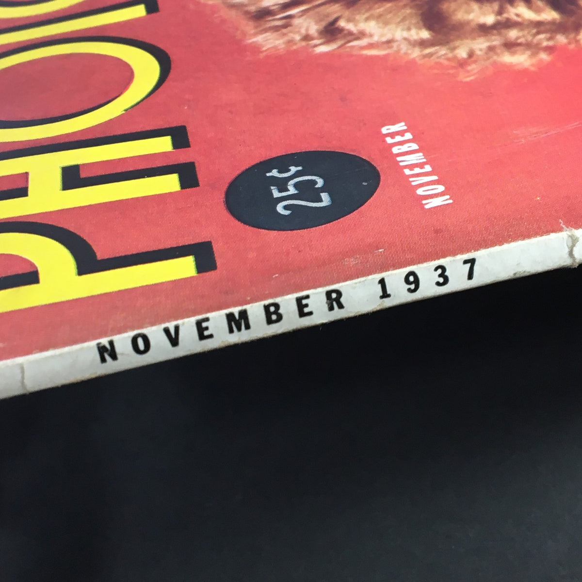 Close-up of the spine of the VTG Photoplay Magazine November 1937 featuring the date and price, showcasing cinematic history with Greta Garbo, Charles Boyer, and Irene Dunne.