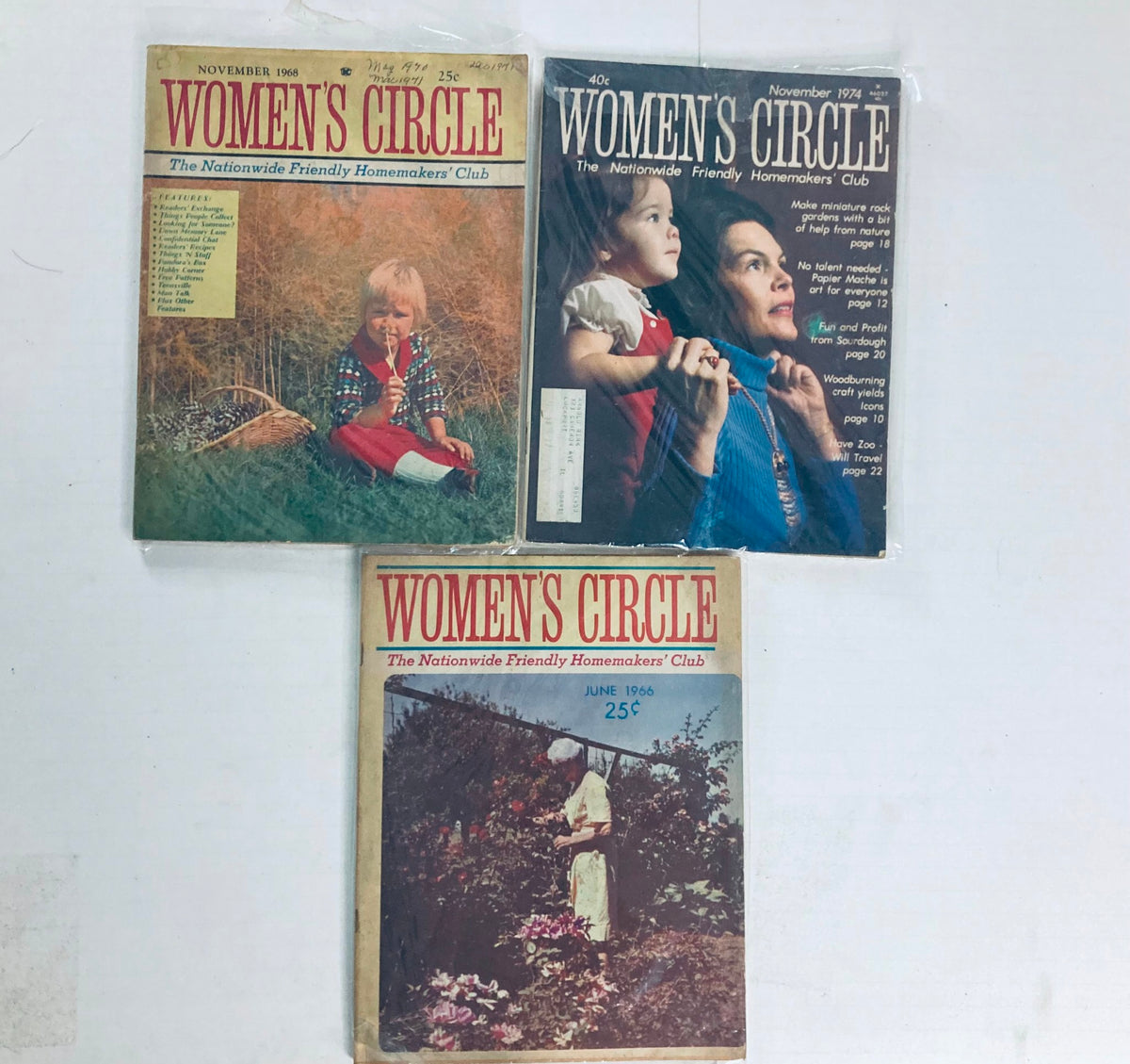 Lot of 27 1960s 1970s Women's Circle Friendly Homemakers' Club Magazine displaying three vintage issues, highlighting nostalgic artwork and homemaking tips, perfect for those interested in vintage women's publications.
