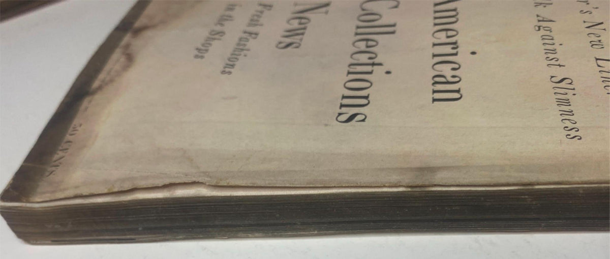 Detailed side view of the spine of Vogue Magazine September 1, 1955 Renée Breton Cover by Henry Clarke, highlighting the vintage condition and texture.