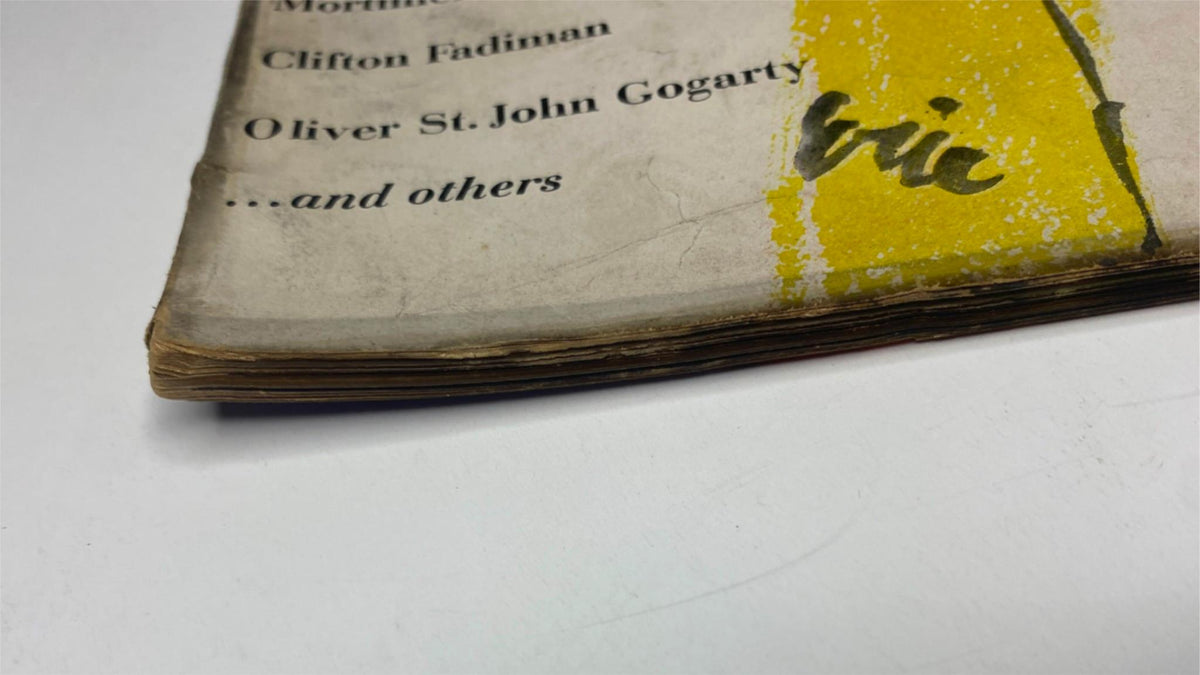Close-up view of the spine of Vogue Magazine January 15, 1944, showing light wear and vintage characteristics, part of a collection of original magazines.