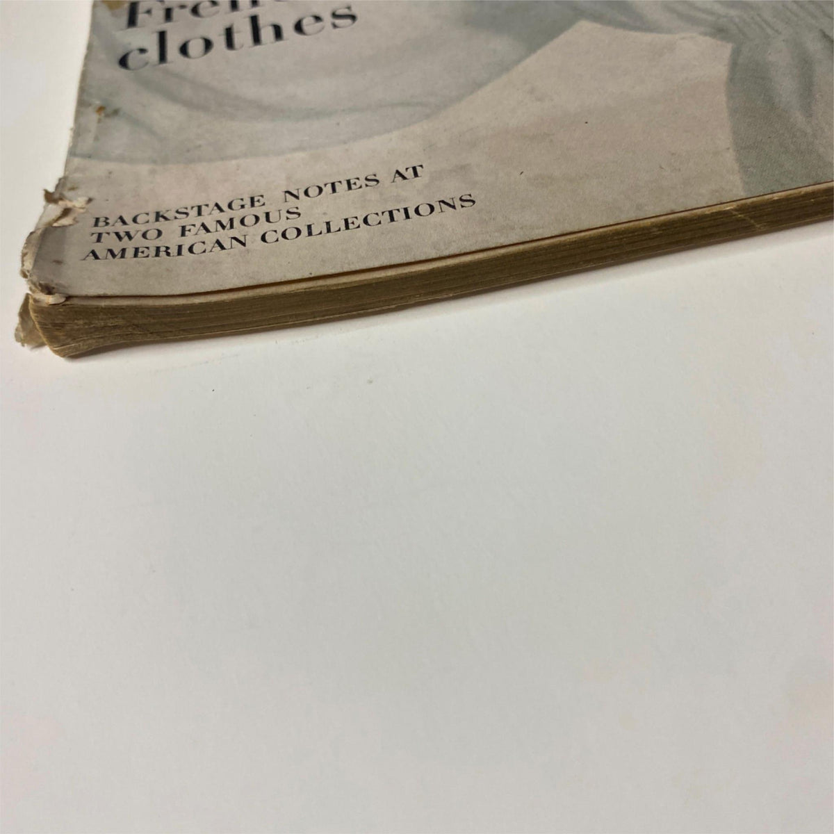 Vogue Magazine March 1, 1963 Anne De Zogheb Cover by Irving Penn depicting the worn spine of the magazine, emphasizing its vintage condition with slight wear.