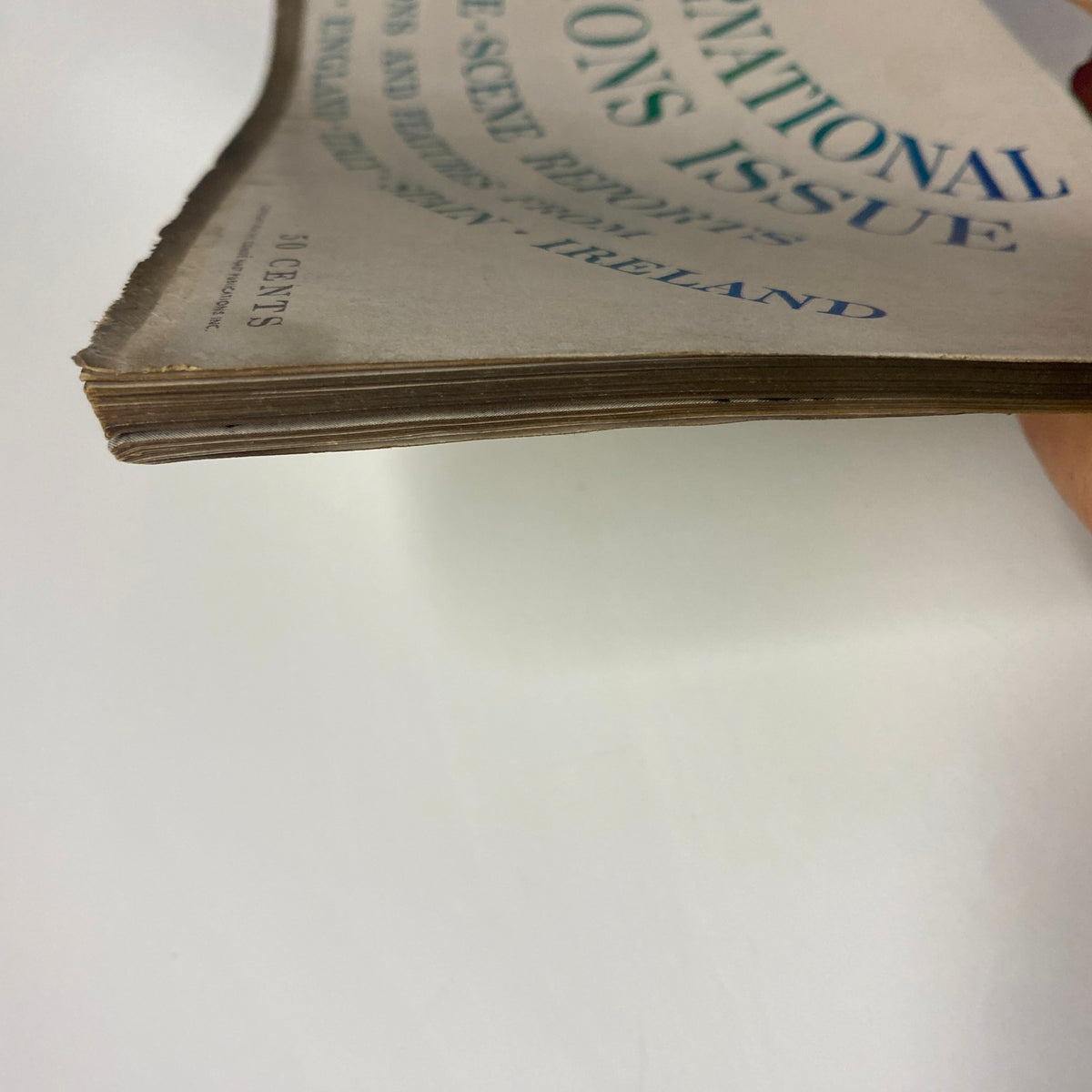 Close-up of magazine spine and edge characteristics from the March 15, 1954 Vogue Magazine, showing signs of aging and authenticity.