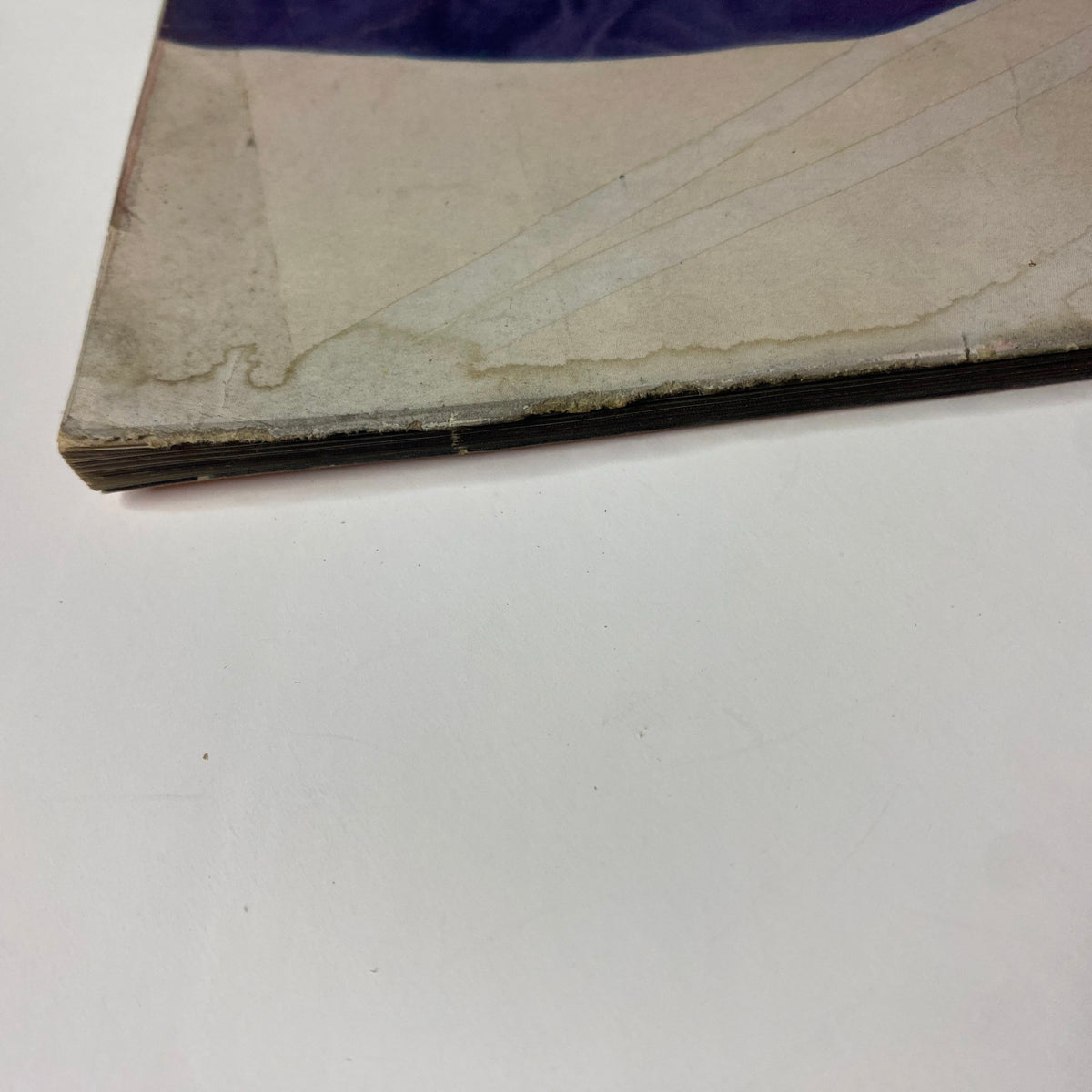 Detail of the spine of Vogue Magazine May 1, 1952 featuring Lisa Fonssagrives cover by Irving Penn, highlighting conditions such as creases and minor wear.