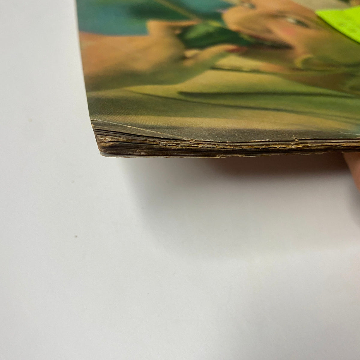Close-up image of the edge of Vogue Magazine July 1, 1947 titled 'Joan Pedersen Cover by Richard Rutledge', emphasizing the vintage wear and character of this original mid-century magazine.
