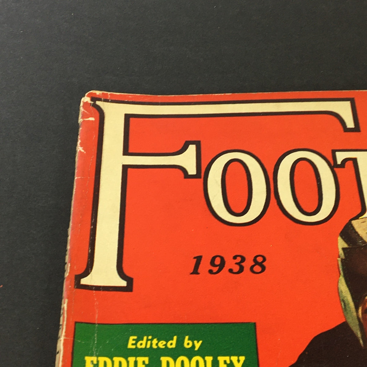 Close-up of the VTG Illustrated Football Annual Magazine 1938 title at the top, showcasing vintage typography and the editor's name, Eddie Dooley.
