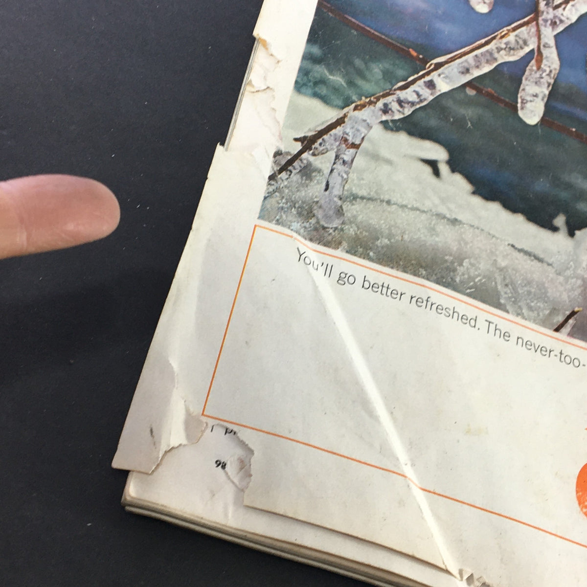 Vintage The American Home Magazine June 1964 Cover image cropped to display damages on the Coca-Cola advertisement highlighting signs of age and wear.