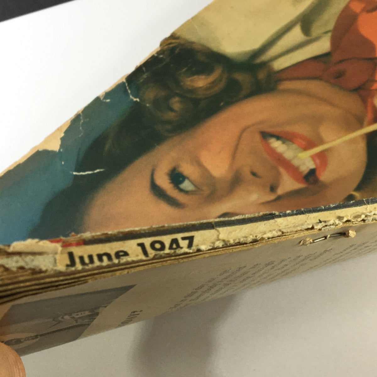 Side view of the vintage True Story Magazine from June 1947, Vol 56 #5, highlighting the publication date and showing some wear on the edges.