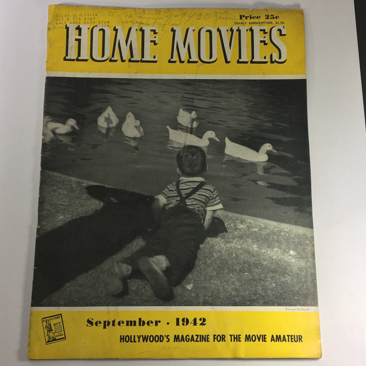 Cover of VTG Home Movies Magazine September 1942 #9 Vol 9 featuring a young boy sitting by a pond watching ducks, showcasing vintage design and artistic photography, highlighting the theme of amateur filmmaking.