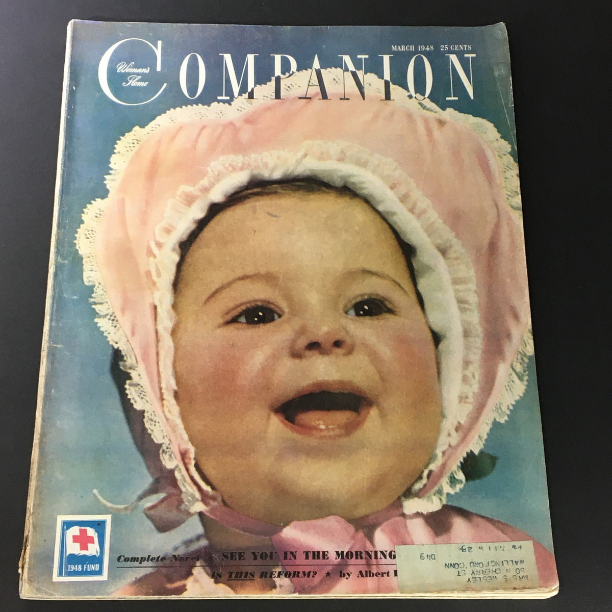 Cover of VTG Woman's Home Companion Magazine, March 1948 Edition featuring a smiling baby in a bonnet, highlights the nostalgic appeal of vintage publications.