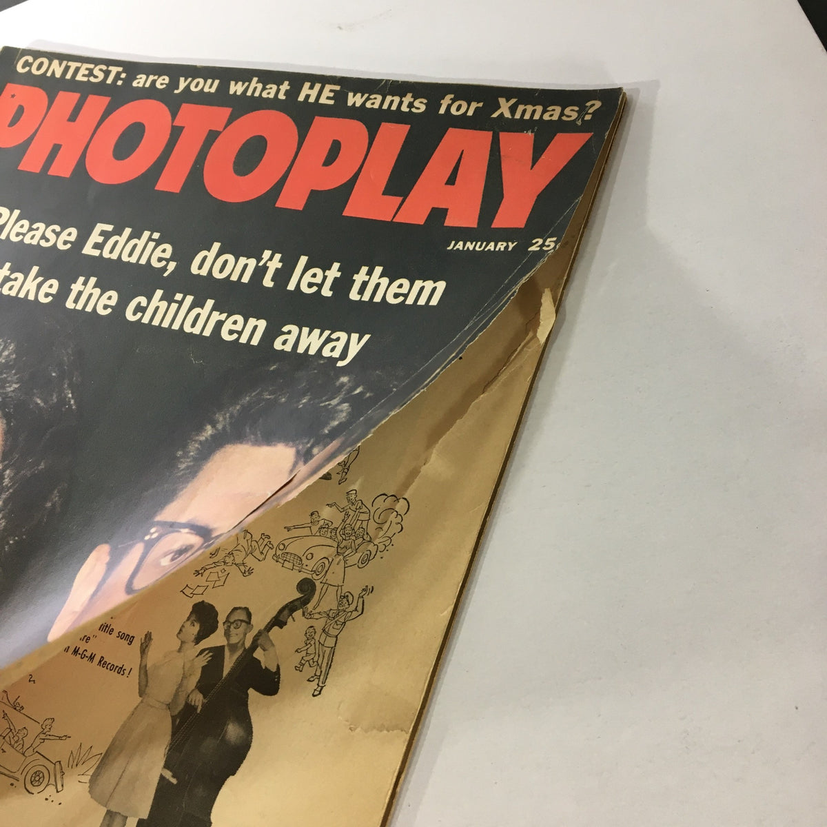 Page corner of the VTG Photoplay Magazine January 1961 revealing promotional content and cover details.