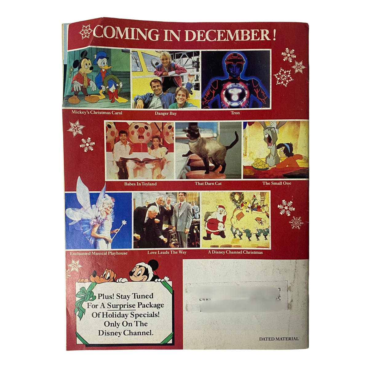 Back cover of The Disney Channel Magazine November 1985 promoting upcoming Disney projects, including 'Mickey's Christmas Carol' and 'Danger Bay', highlighted with festive visuals.