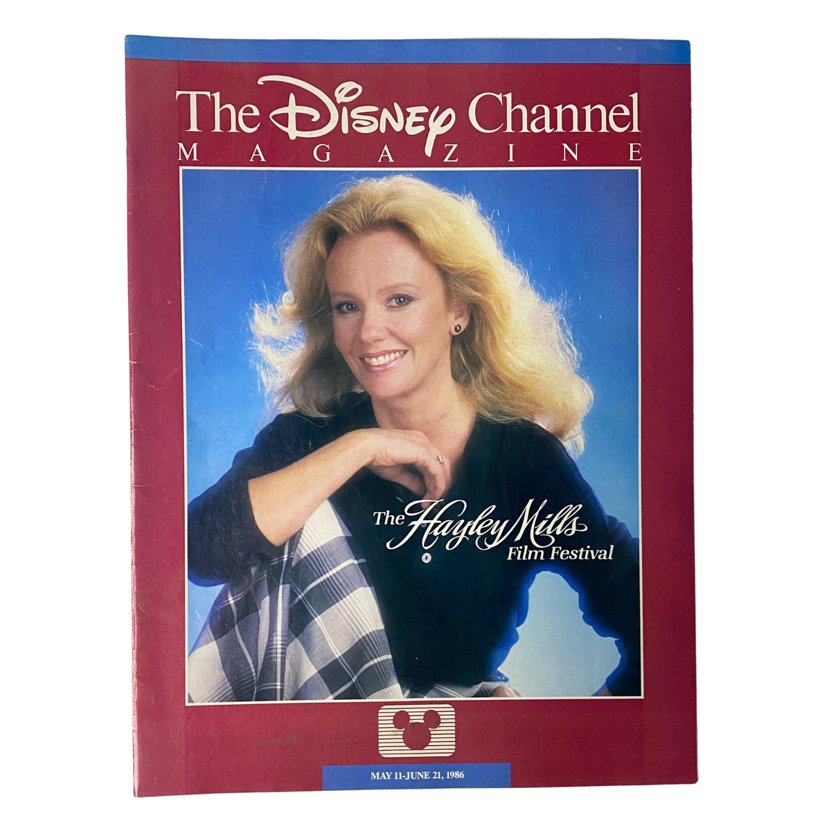 Cover of The Disney Channel Magazine - May 11, 1986, featuring The Hayley Mills Film Festival, showcasing actress Hayley Mills smiling and holding a scarf.