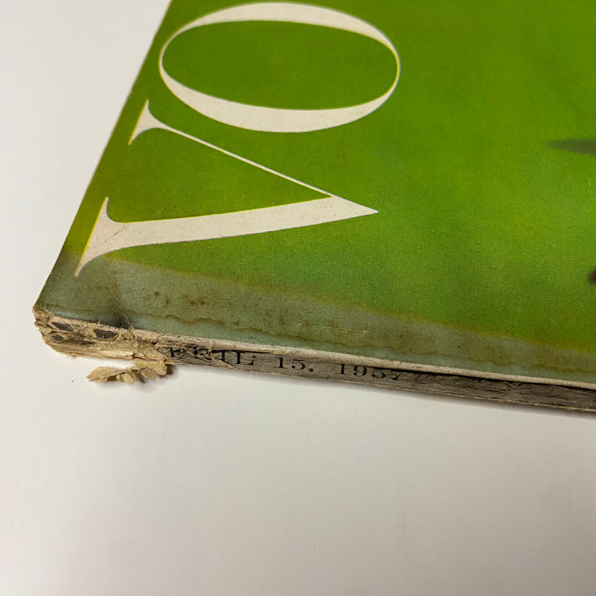 Spine of Vogue Magazine April 15, 1957, noting the date 'April 15, 1957' and featuring the title 'How To Keep Your Audience'. The worn edges reflect the magazine's vintage quality.