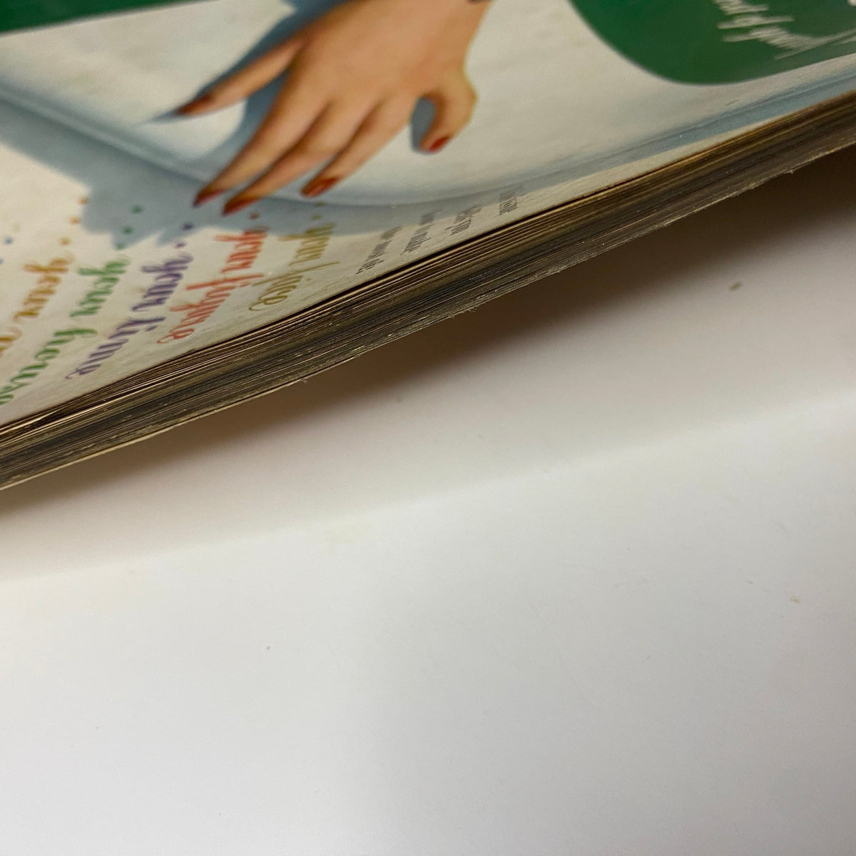 Vogue Magazine April 15, 1941 Mehemed Fehmy Agha Cover GD Interior showing the well-worn edge of the pages with visible age-related wear, reflecting its vintage character.