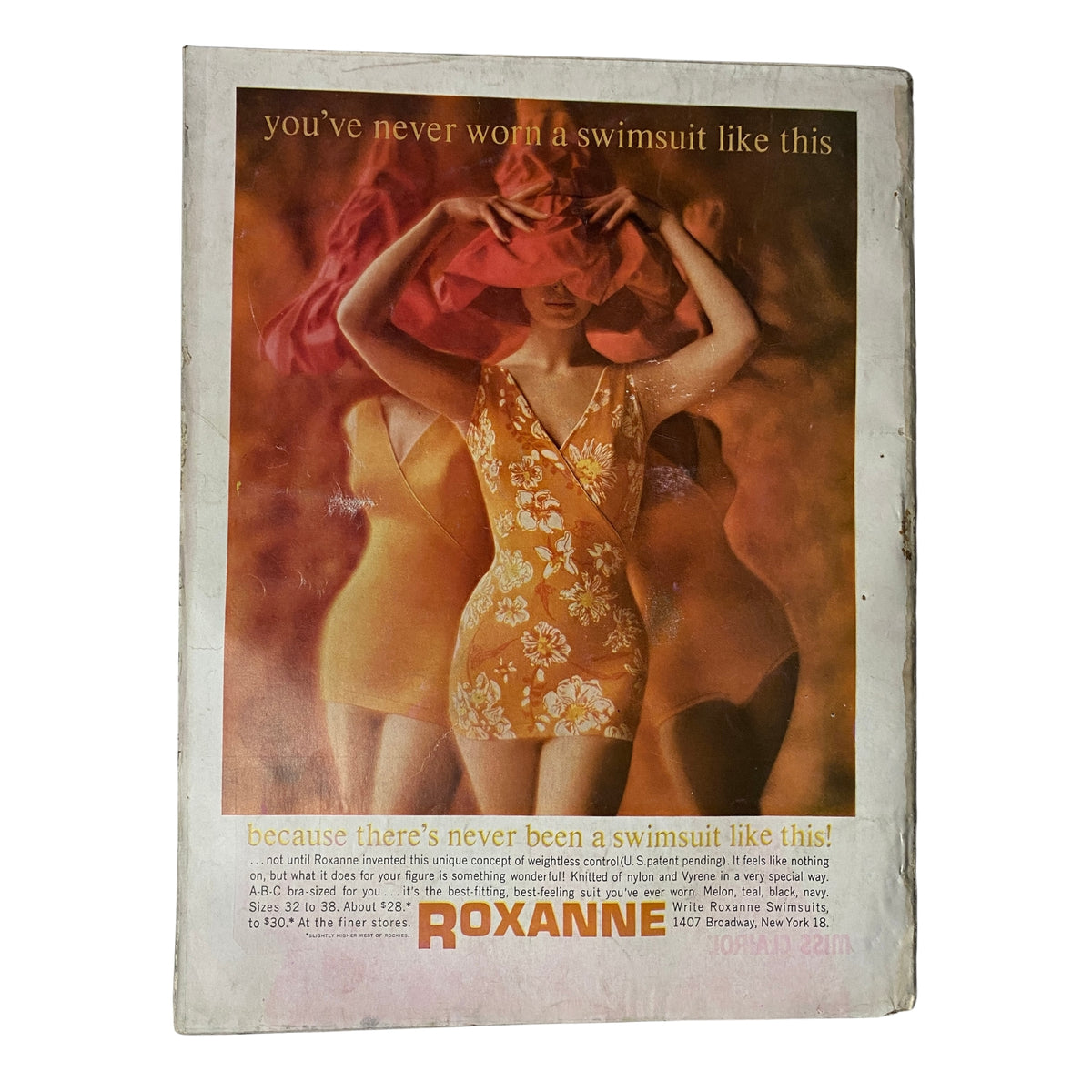 Back cover of Vogue Magazine June 1961 Dorothy McGowan Cover by Tom Palumbo featuring a colorful advertisement for swimsuits, emphasizing its vintage appeal.