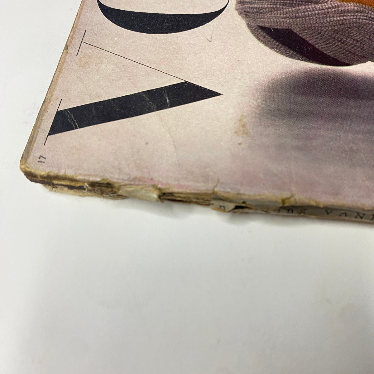 Close-up of the edge of Vogue Magazine September 1, 1944, highlighting its vintage characteristics and wear. Cover features Selene Mahri, captured by John Rawlings.