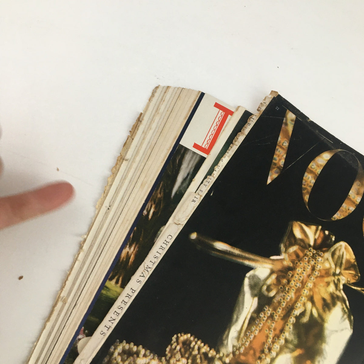 Detailed view of the upper edge of the VTG Vogue Gifts Magazine November 15, 1945, showing the title and decorations, ideal for vintage magazine collectors.