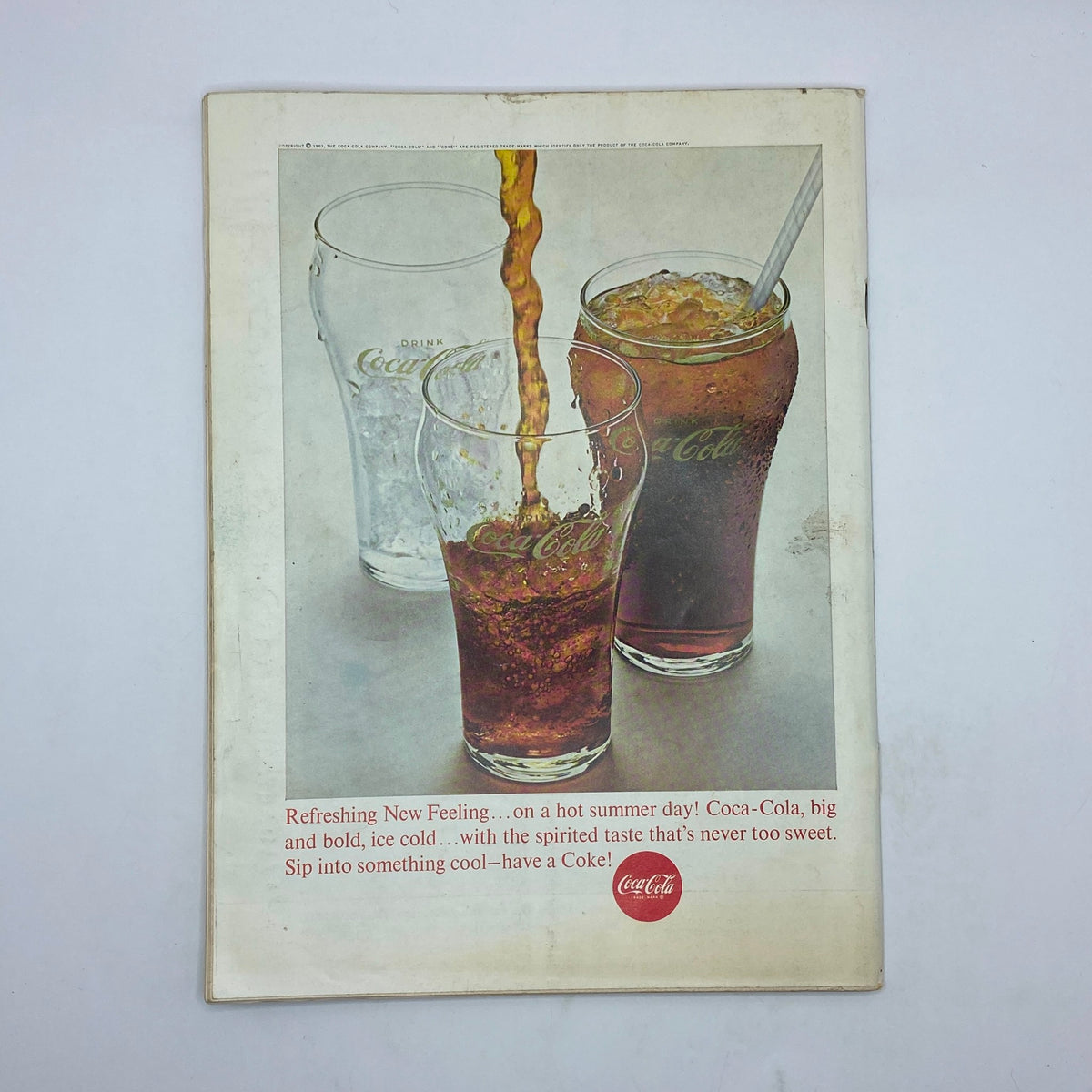 Back cover of The New Yorker Complete Magazine June 22, 1963 featuring a Coca-Cola advertisement depicting glasses with drinks, promoting a refreshing beverage.