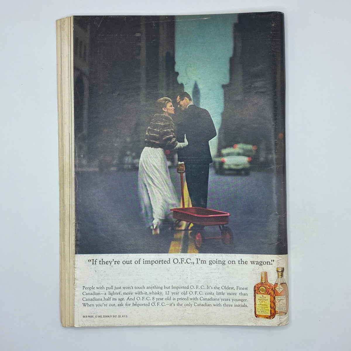 Back cover of The New Yorker Complete Magazine, June 6, 1964 featuring an advertisement with a couple on a city street and the quote 'If they're out of imported O.F.C., I'm going on the wagon.'