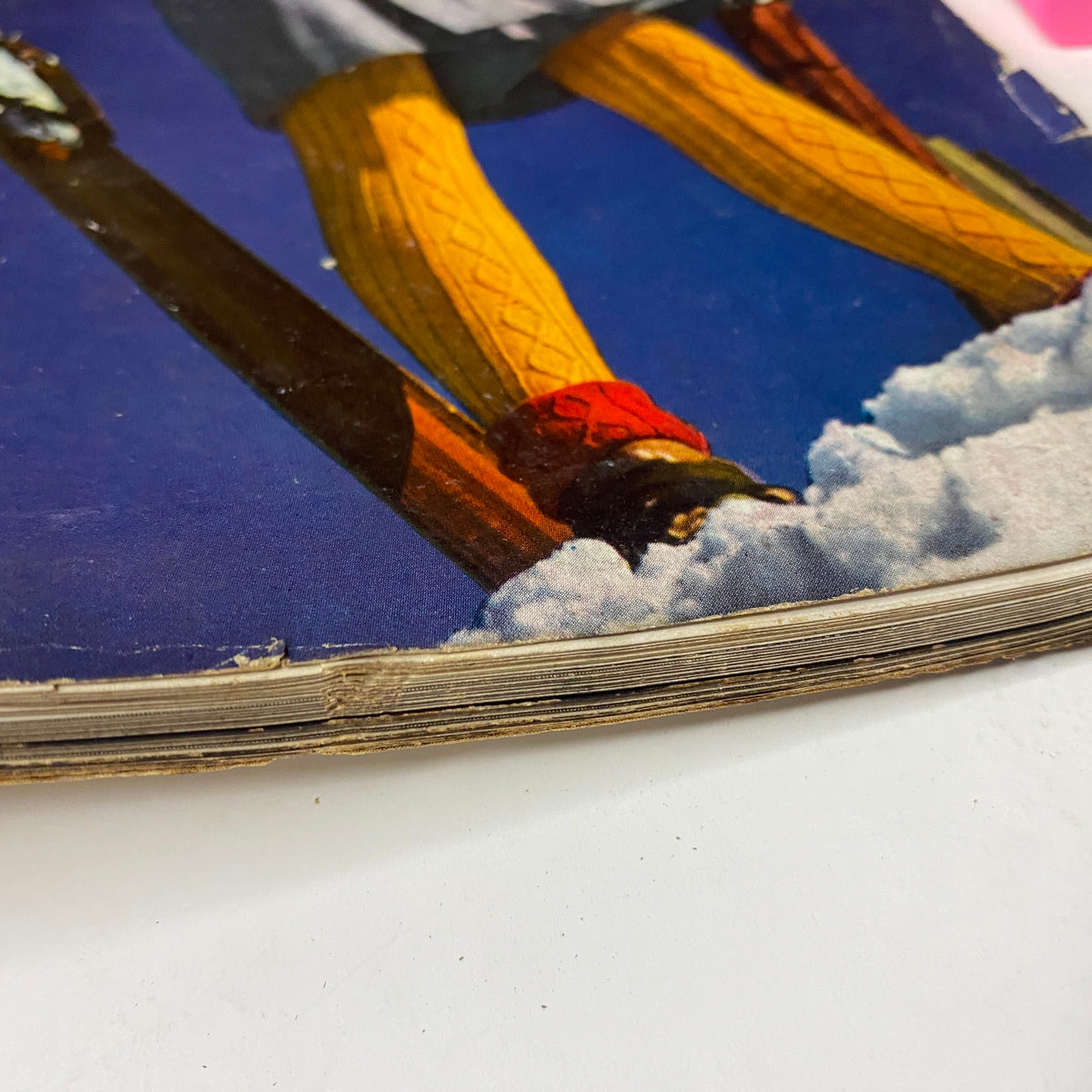 Vogue Magazine January 1, 1941 Ski Girl Cover by Toni Frissell GD Interior, depicting the worn edges of the magazine, showcasing its vintage condition.