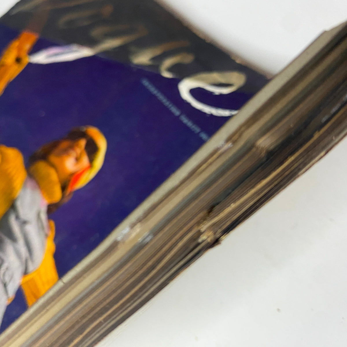 Vogue Magazine January 1, 1941 Ski Girl Cover by Toni Frissell GD Interior, showing the rustic spine and edges of the magazine, emphasizing its historical significance.