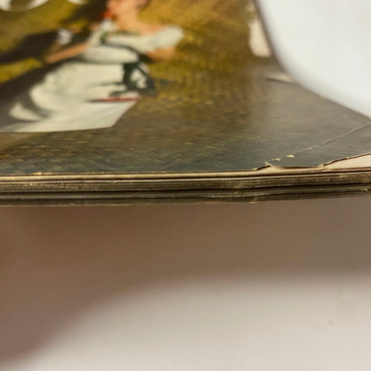Spine view of Vogue Magazine June 1, 1943 Florence Dornin Cover by John Rawlings, highlighting worn edges and binding.