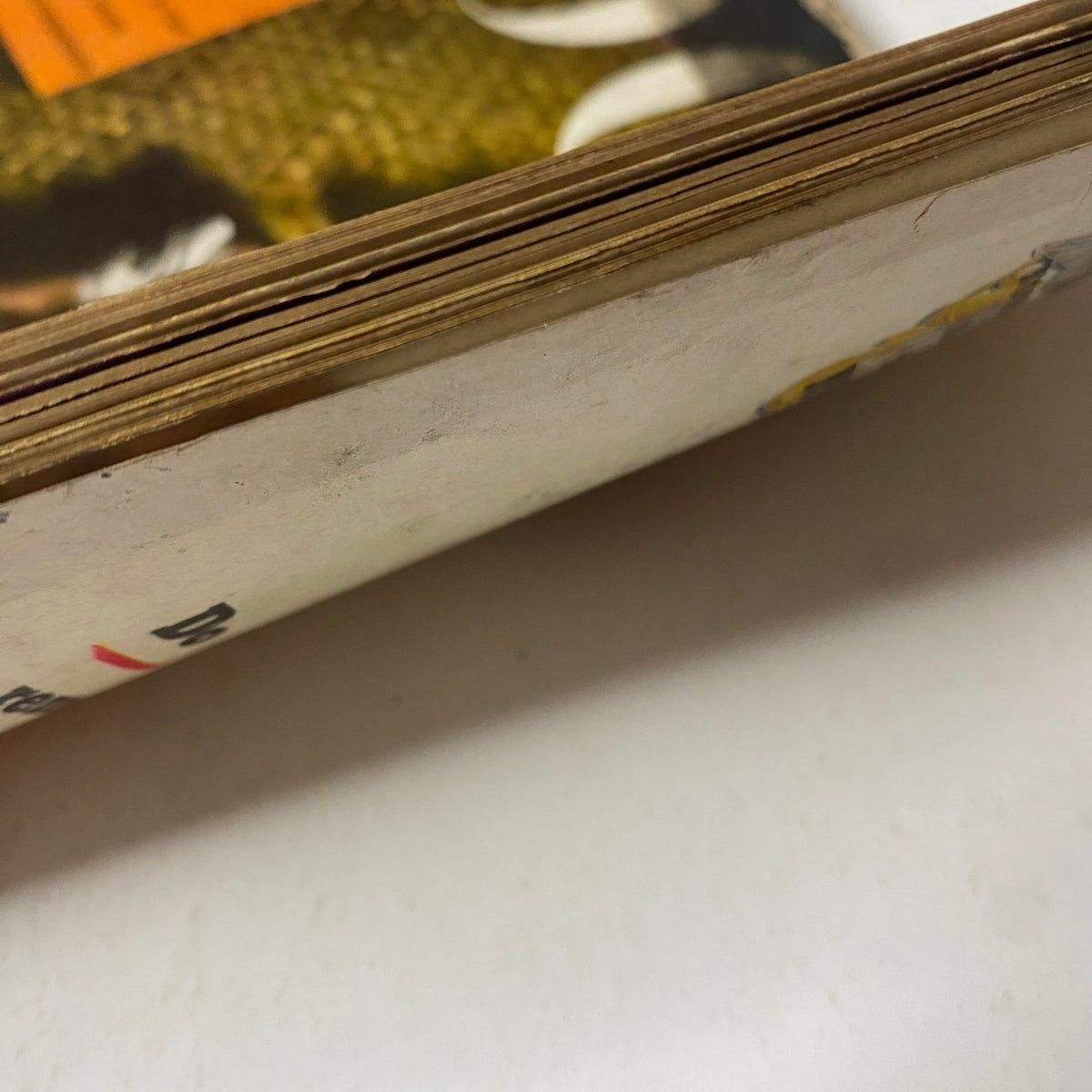 Another angle of the spine of Vogue Magazine June 1, 1943 Florence Dornin Cover by John Rawlings, showcasing vintage wear.