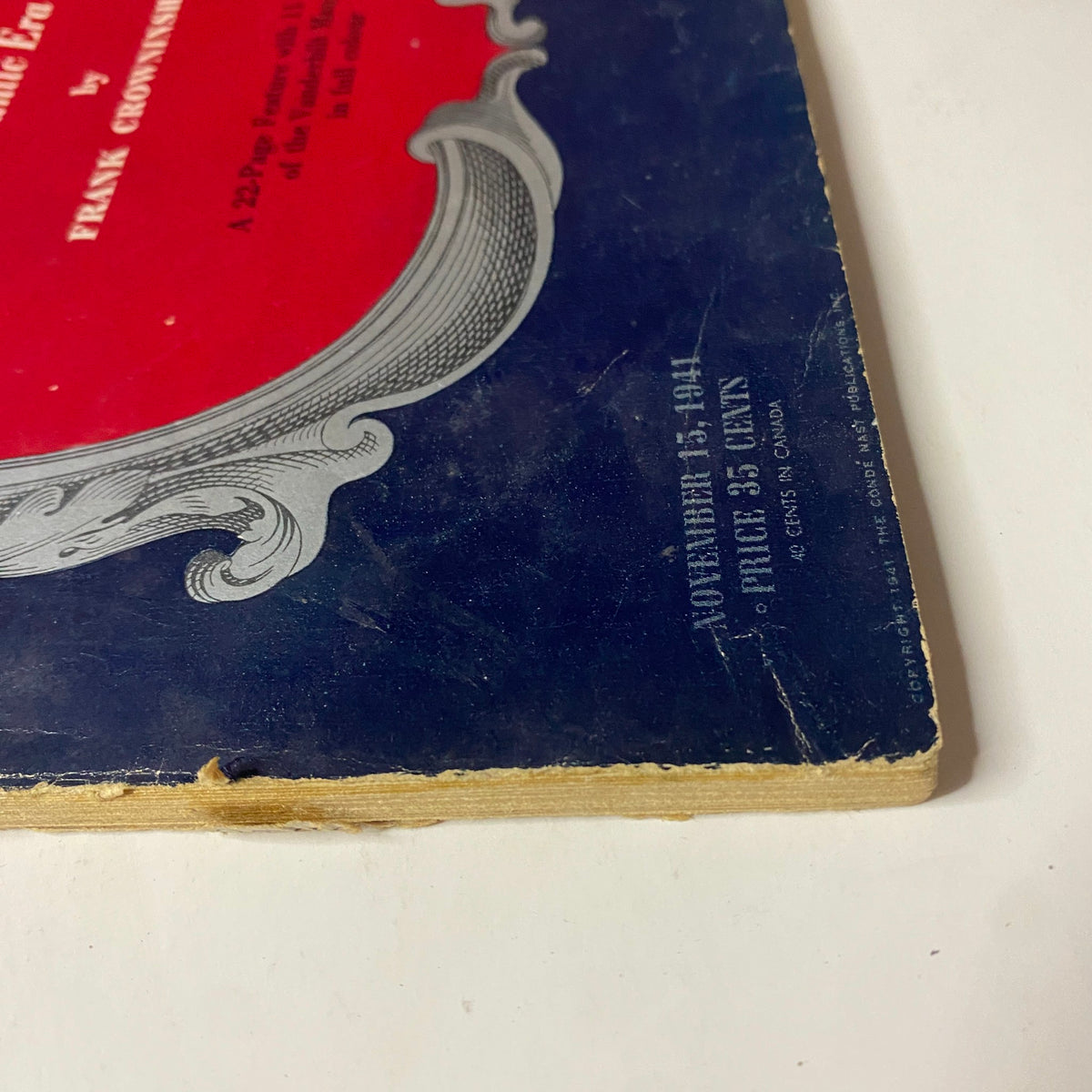 Detailed view of the back cover of Vogue Magazine November 15, 1941 The House of Vanderbilt, showing wear along the edge.