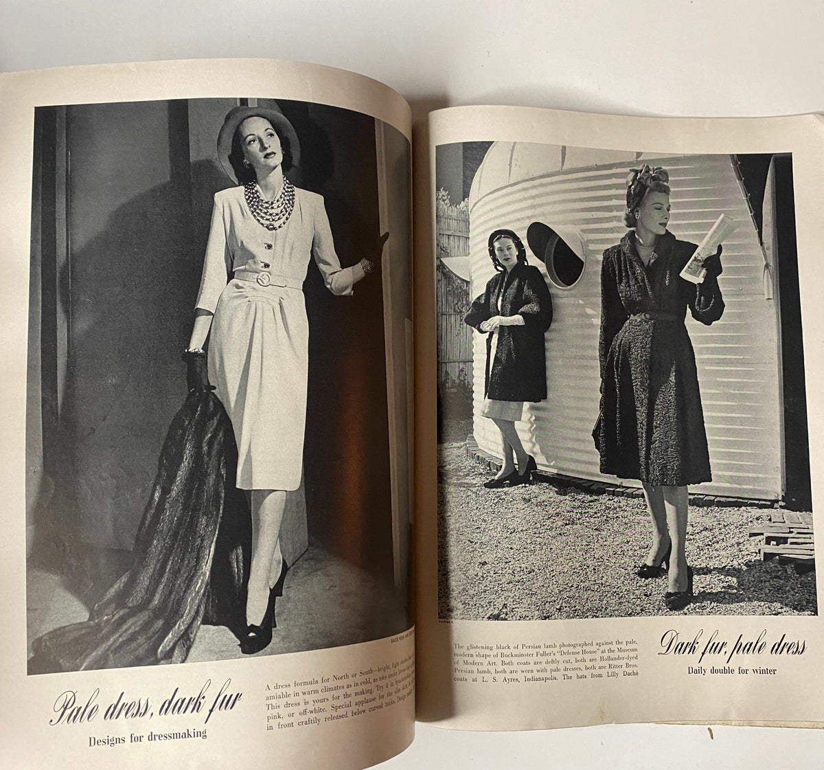 Vogue Magazine November 15, 1941 The House of Vanderbilt GD Interior displaying two elegant women in fashionable outfits, one in a pale dress with dark fur accents, for design inspiration.