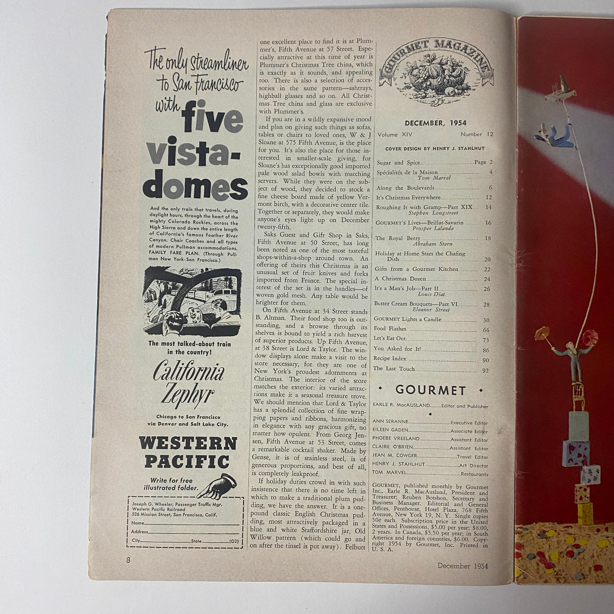 Inner pages of Gourmet Magazine, December 1954, displaying an article with advertisements and content listings for holiday recipes and culinary features.